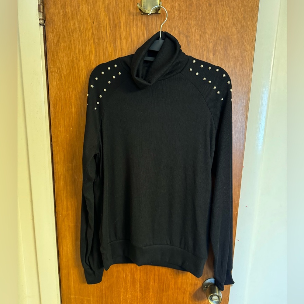 NWT solid black turtleneck sweater with silver shoulder stud detail size L